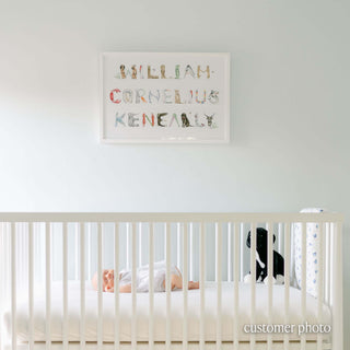 Customer Photo with Full Name Print in Animal theme over a baby's crib in the name "William Cornelius Keneally" using all animal letters