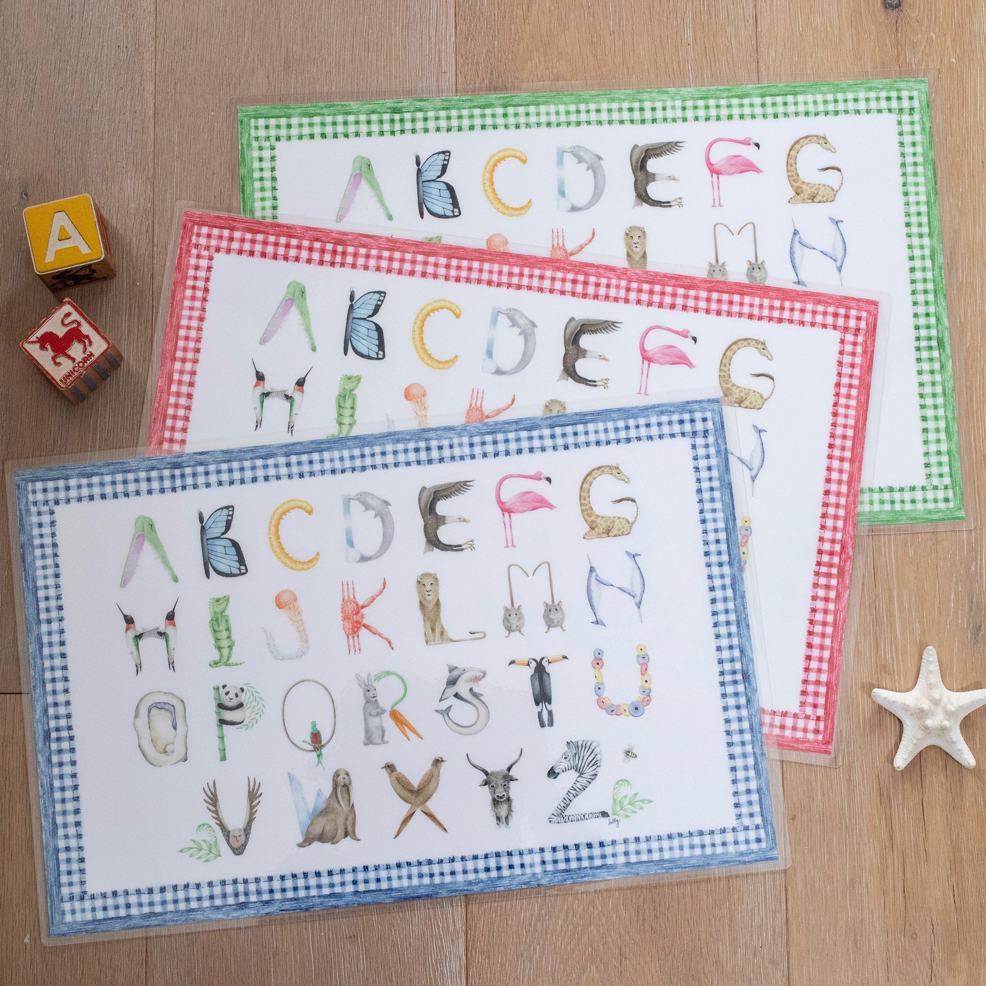 Animal Alphabet Placemats shown with green, red and blue gingham borders