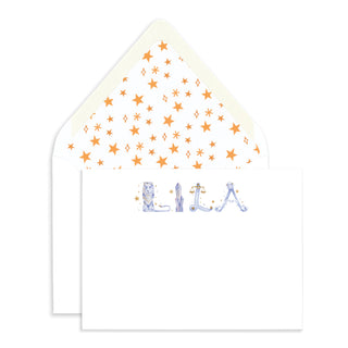 Astrology stationery in name "Lila" shown with a watercolor star envelope liner