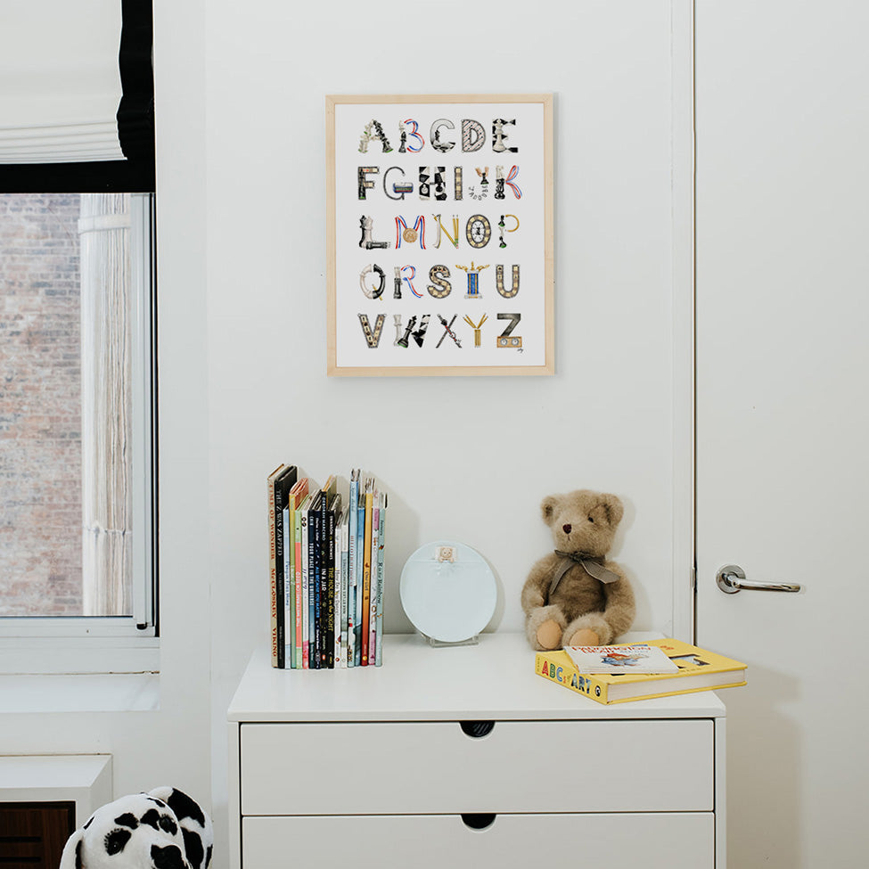 Chess Alphabet in a Natural Frame hanging in a nursery