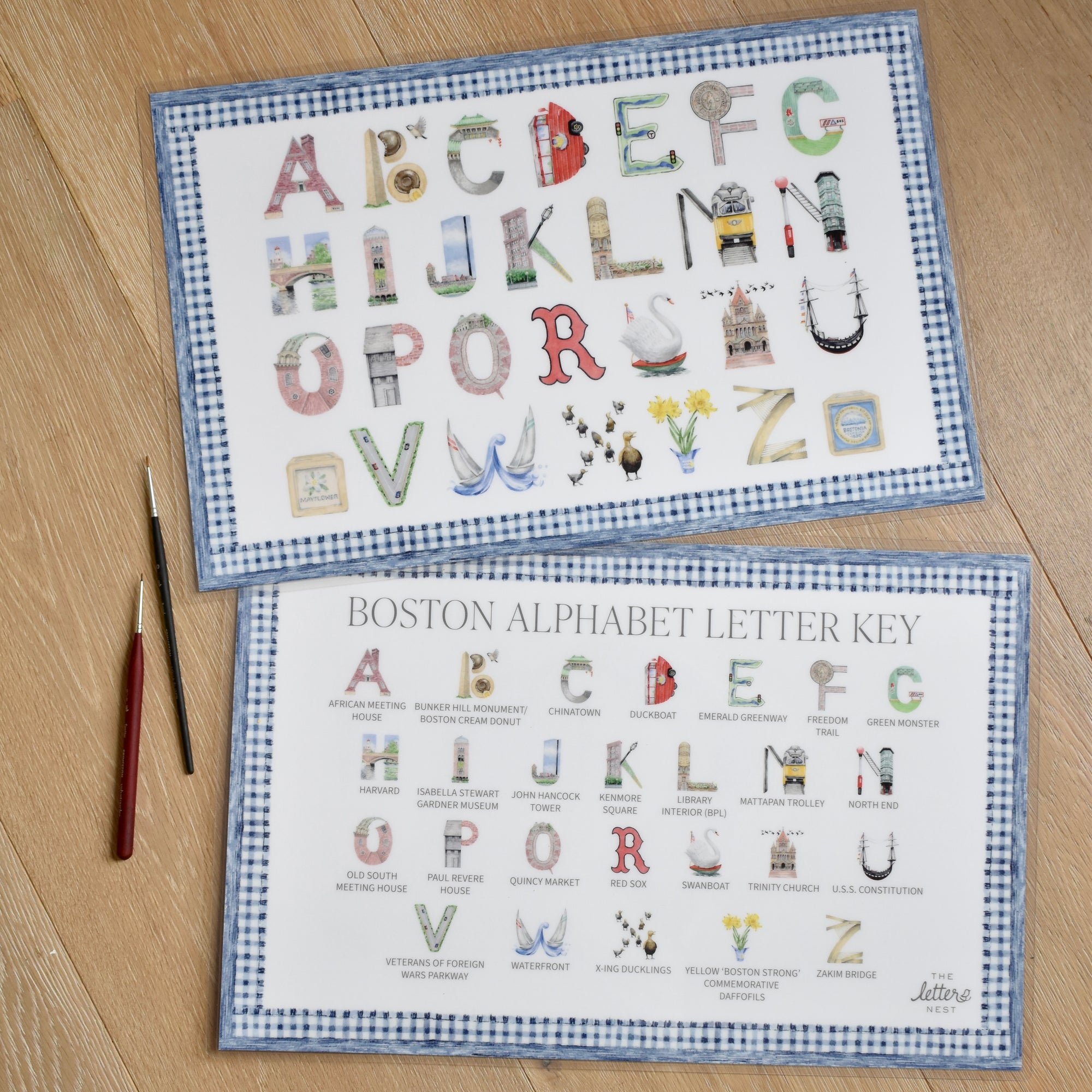 Boston Alphabet laminated Placemat  with blue gingham border showing front and back sides
