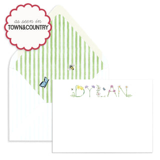 Personalized Flower Stationery by The Letter Nest in the name "Dylan" with an envelope with green watercolor stripes and a bee and butterfly accent