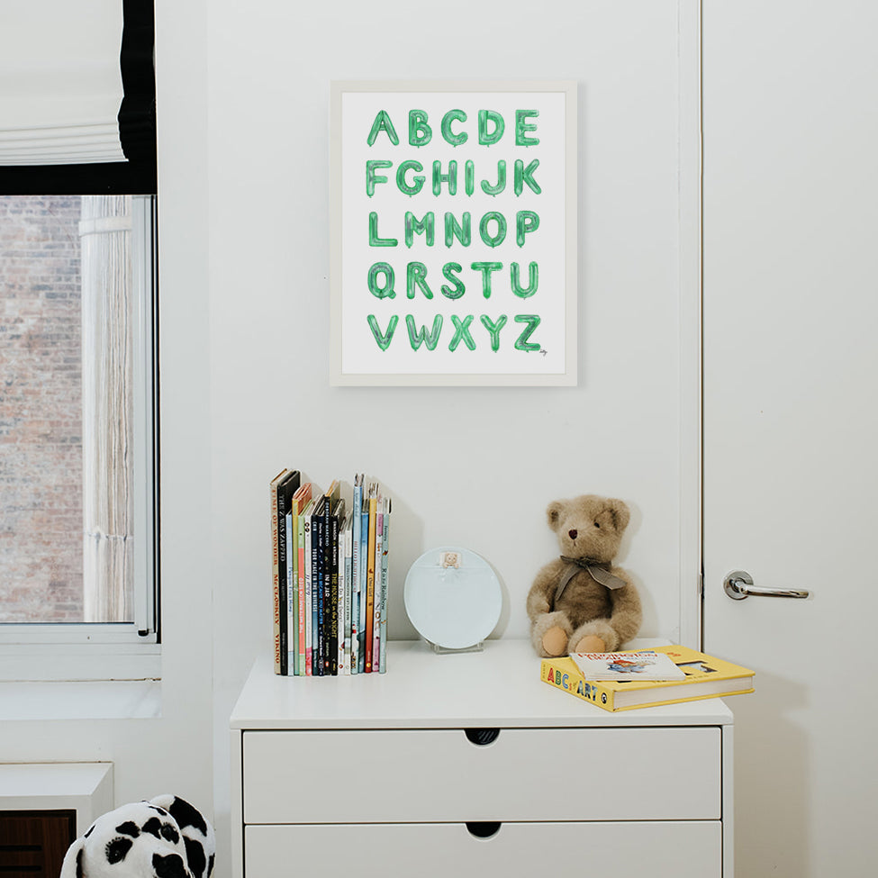 Green Balloon Alphabet from The Letter Nest, White Frame installed in nursery