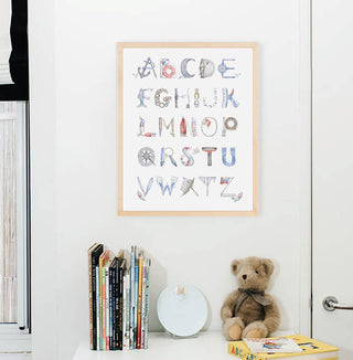 Nautical Alphabet Natural Frame from The Letter Nest, shown in a children's nursery