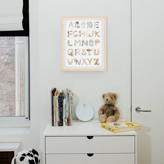 Shell Alphabet with Scallop Border , shown in a Natural Frame installed in nursery