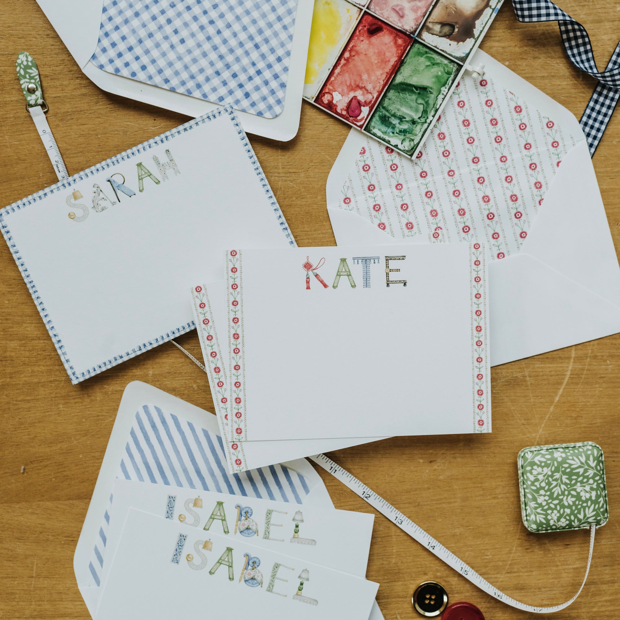 Personalized Interior Design Stationery shown in the names "Sarah," "Kate," and "Isabel" with matching envelope