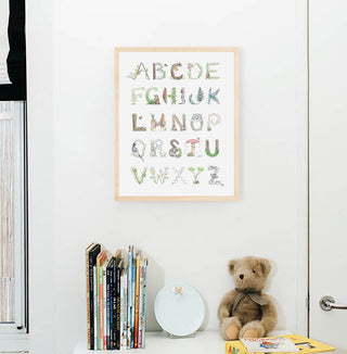 Woodland Alphabet, Natural Frame from The Letter Nest, shown in a children's nursery