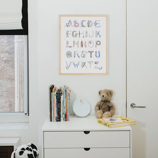 Nautical Alphabet Natural Frame from The Letter Nest, shown in a children's nursery