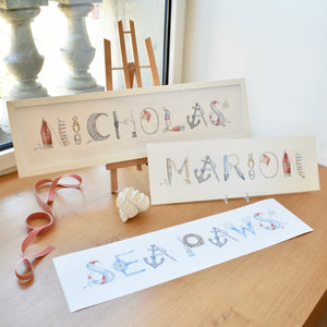 Nautical Custom Name Prints by The Letter Nest styled in a windowsill with various frame options