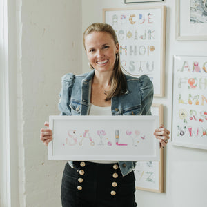 Artist Sally King McBride holding "Sally" Custom Name Print in Annabel theme