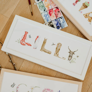 "Lilly" Animal Name Print in a white frame